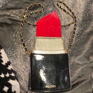 Lipstick shaped purse form Aldo’s